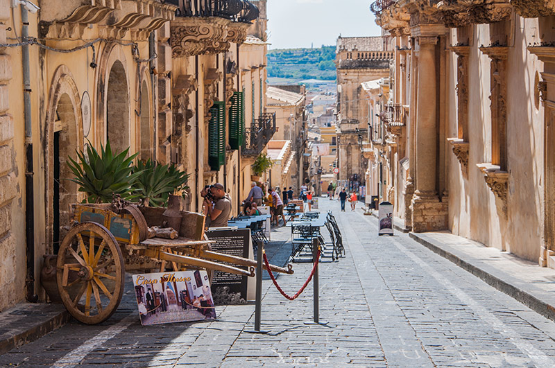 Traditional Sicilian cart on street in old city centre of Noto